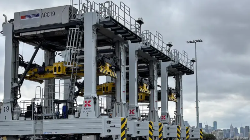The hybrid automatic container carriers on the quayside at VICT