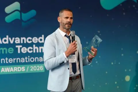 Luke Jenkinson, founder and group CEO of ELIRE Group receiving the award for the Ports and Harbors Innovation of the Year award at the Advanced Maritime Technology International Awards 2026 in Amsterdam