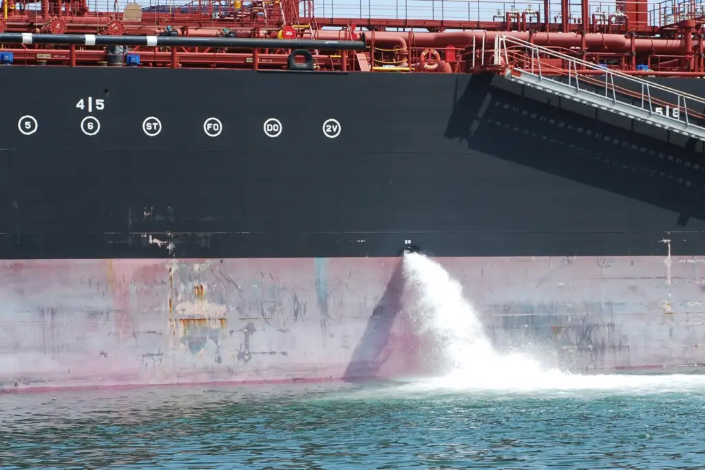 Ballast water being discharged from a ship