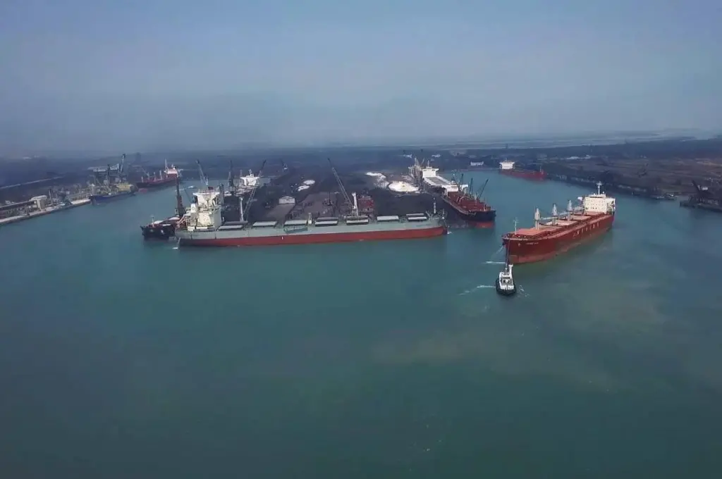 A wide angle shot of Paradip's busy port channel