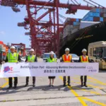 Employees in Hong Kong launching a port electrification project