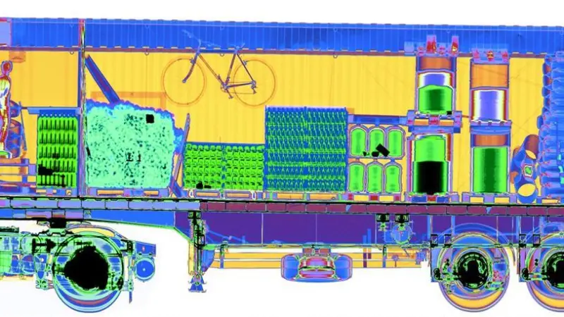 A side view of a container truck after being X-ray scanned.