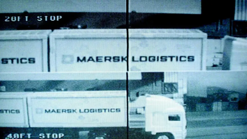 Typical in-cab arrangement. (Inset): Typical split screen view for a 20 and 40/45 foot container