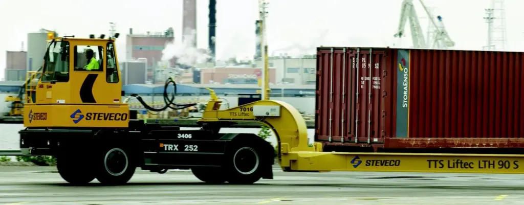 A tugmaster pulls a SECU, which can be cross-docked from rail to ship in the new NETSS transportation strategy