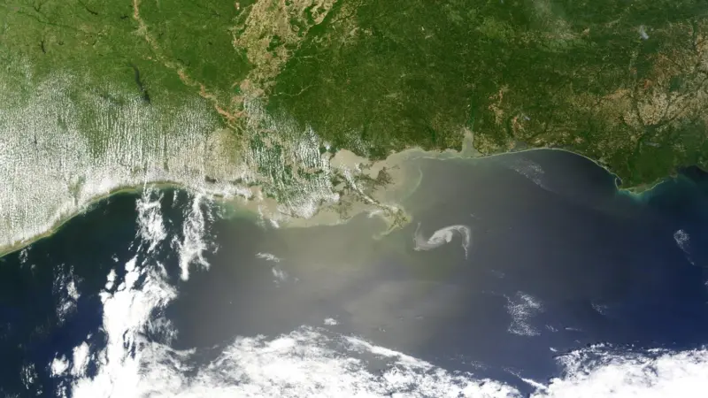 The oil spill creeps closer to the Mississippi Delta - but a loop current may take some of it to Florida. Photo: NASA