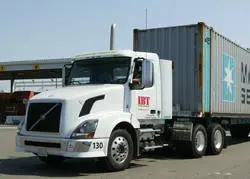 100% of containers in and out of Port Terminals now hauled by clean trucks in L.A.