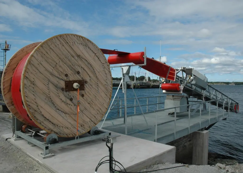 Poised for action: the robotic oil boom is ready for instant deployment