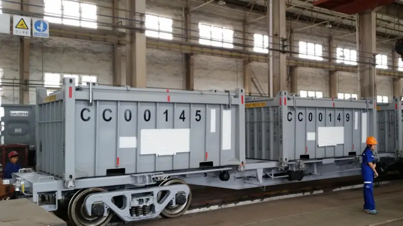 The bulk containers are loaded on to specialised rail wagons to be taken to the port for discharge