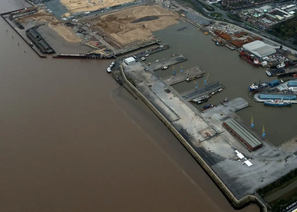 Excess sand from the dock infill is now being moved to the reclaim