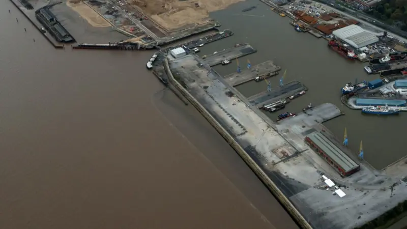 Excess sand from the dock infill is now being moved to the reclaim