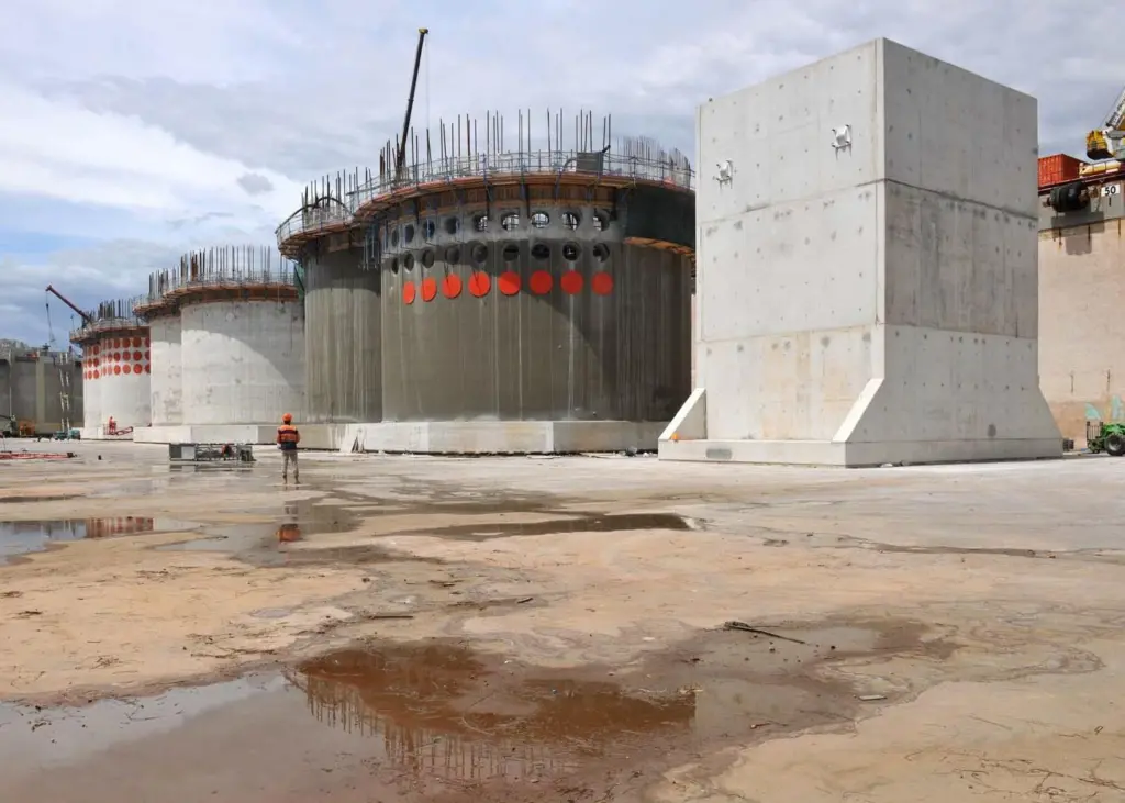 Construction work: The new 9,100 tonne dock gate and three 4,500 tonne caissons will form the remodelled ends of the sea walls