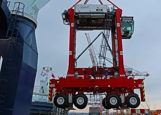 Nine new Kalmar straddle carriers being discharged at DP World Southampton