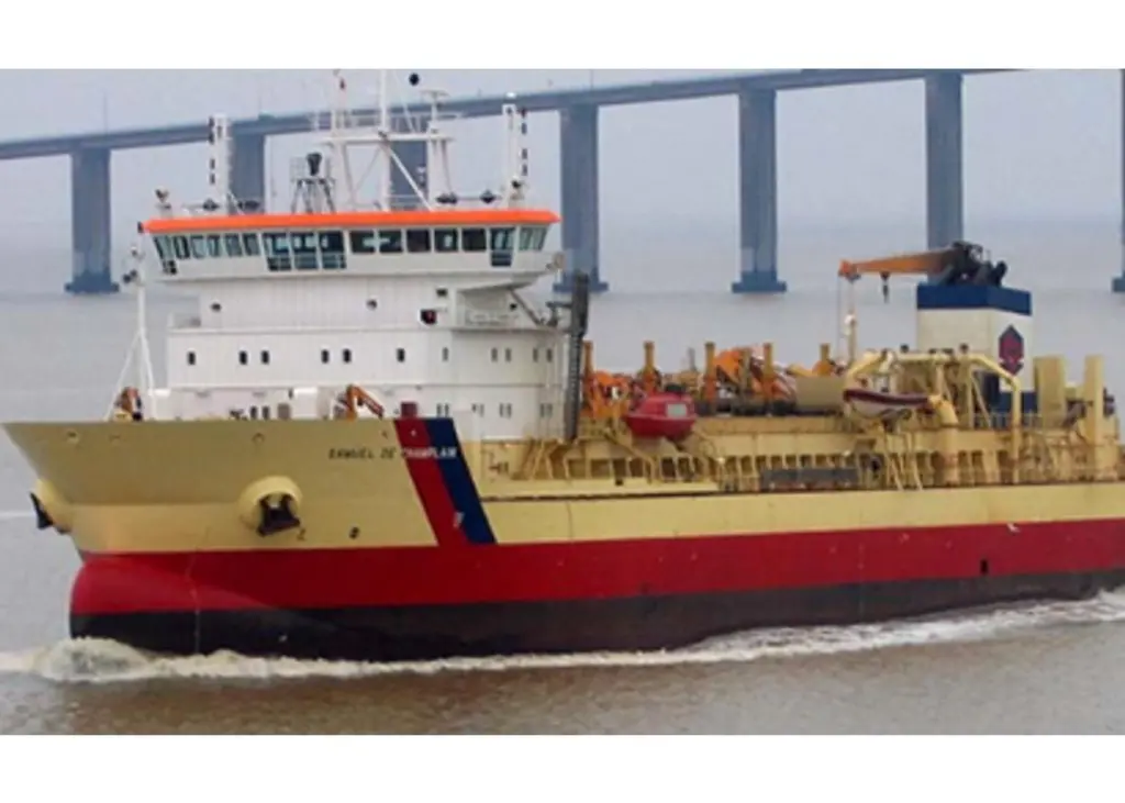 Samuel de Champlain dredger operating in front of Saint Nazaire bridge in the Loire Estuary Photo: Dragages Ports