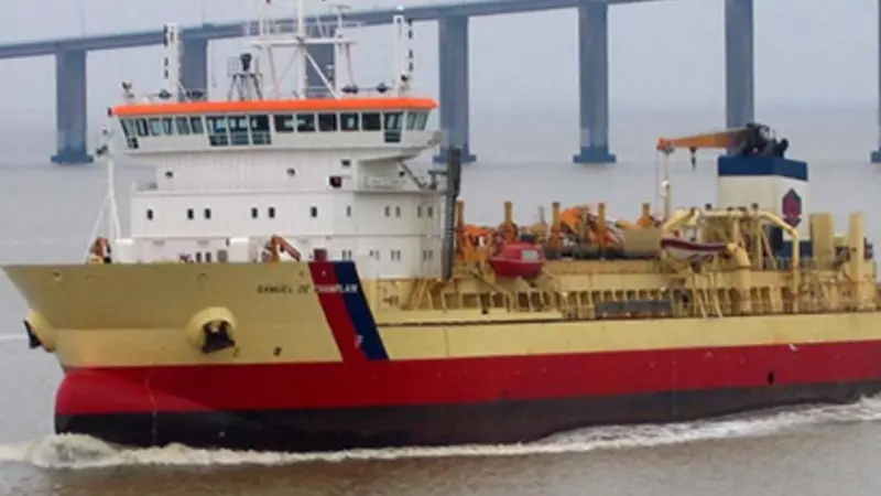Samuel de Champlain dredger operating in front of Saint Nazaire bridge in the Loire Estuary Photo: Dragages Ports