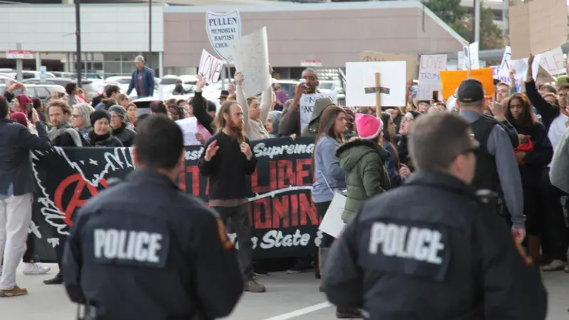 Shout out: too much protesting is bad for consumer spending and consequently trade. Credit: Matthew Lenard