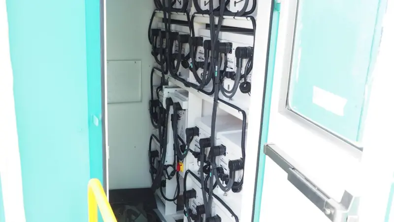 A control cab of hybrid RTG showing the previous generation of Corvus Energy ESS