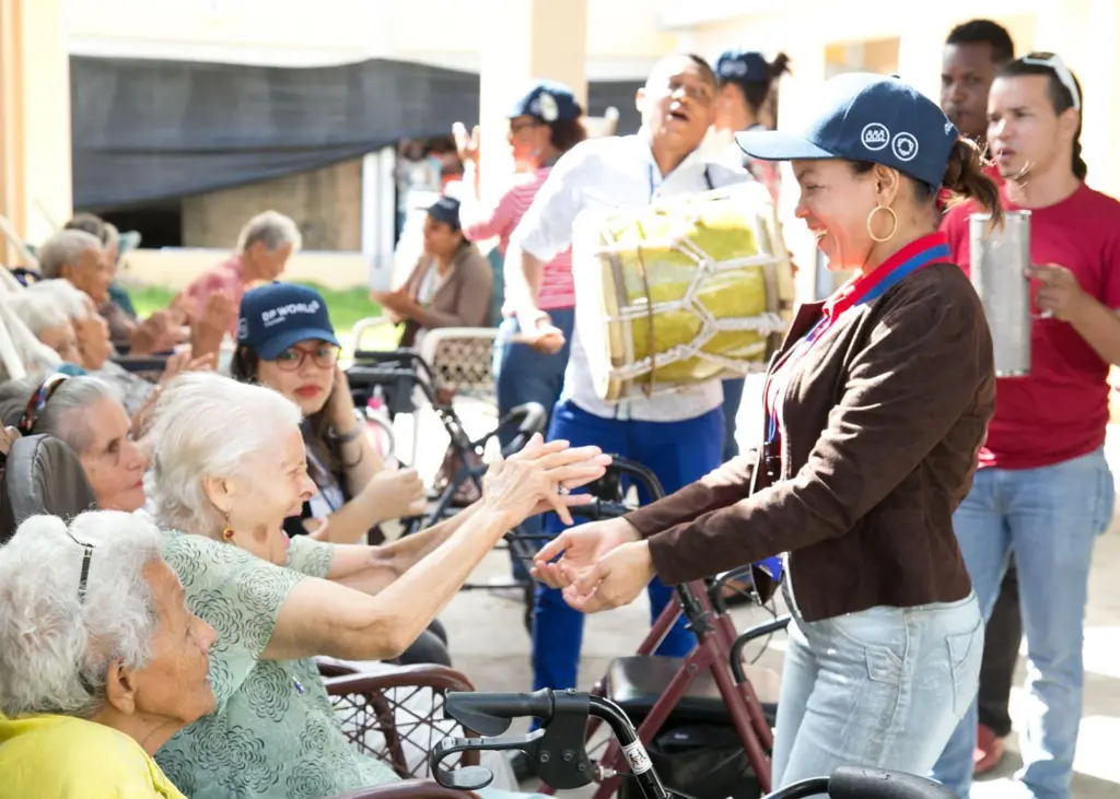 In the Dominican Republic, volunteers visit a home for elderly people