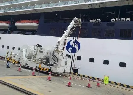 A battery-powered AMPMobile unit connects a ship to shore power at Shenzhen cruise terminal