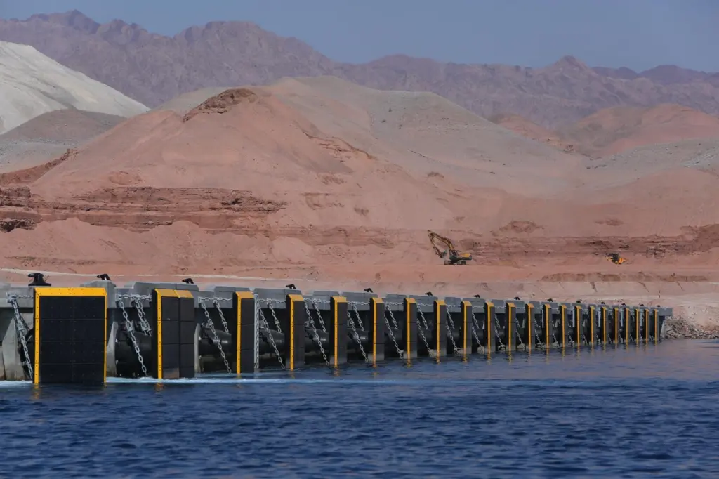 An array of fenders across a port.