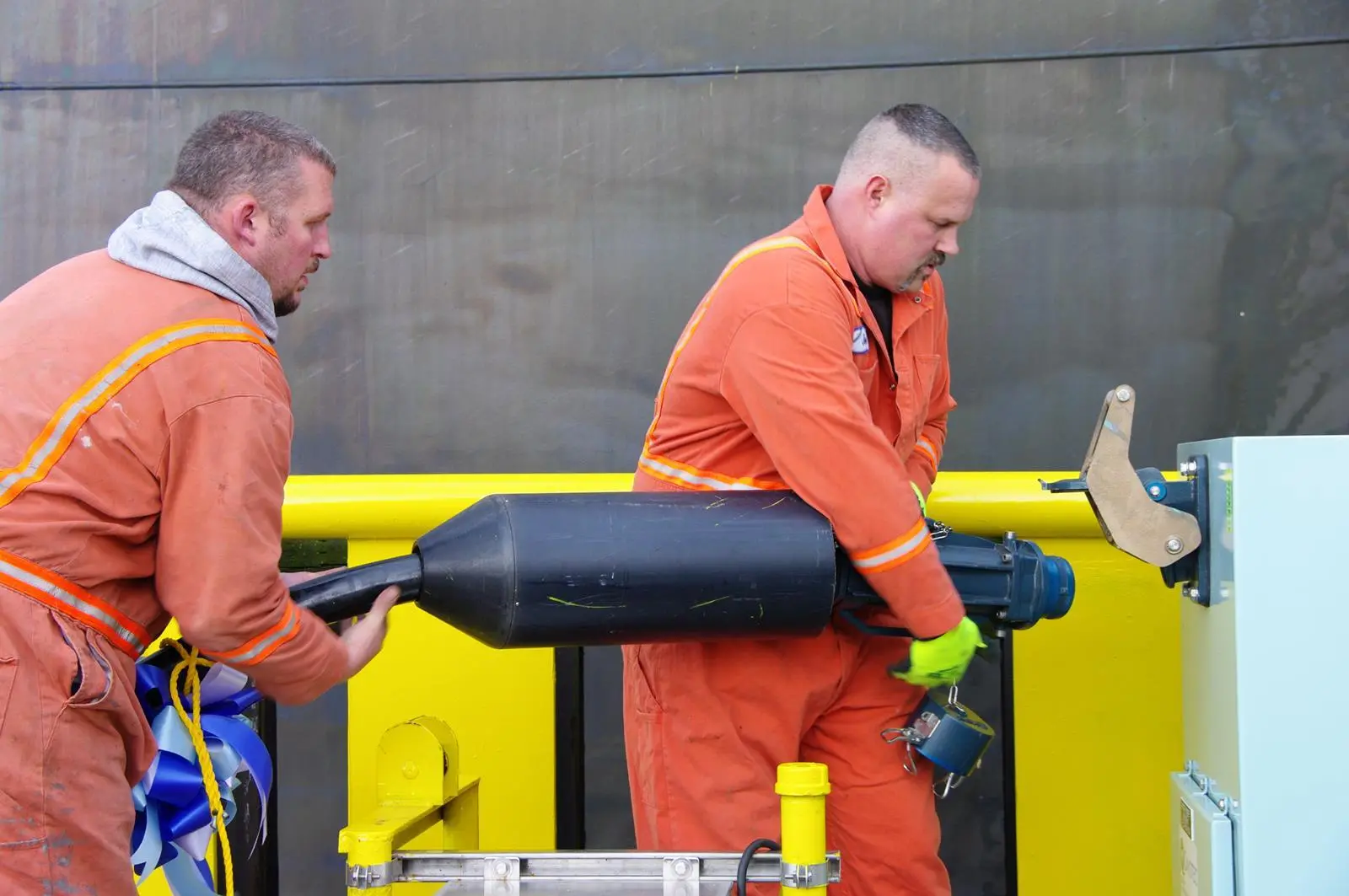 Workers at a shore power installation