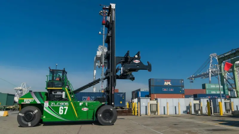The Taylor battery-electric top handlers can make it through the daily two-shift cycle before needing a recharge Photo: POLB