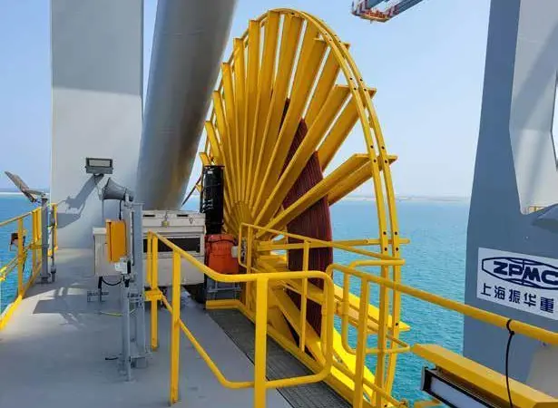 Conductix-Wampfler says that cable reels are the only practical means to feed MW power and Gigabits/s of data 24/7 to container cranes
