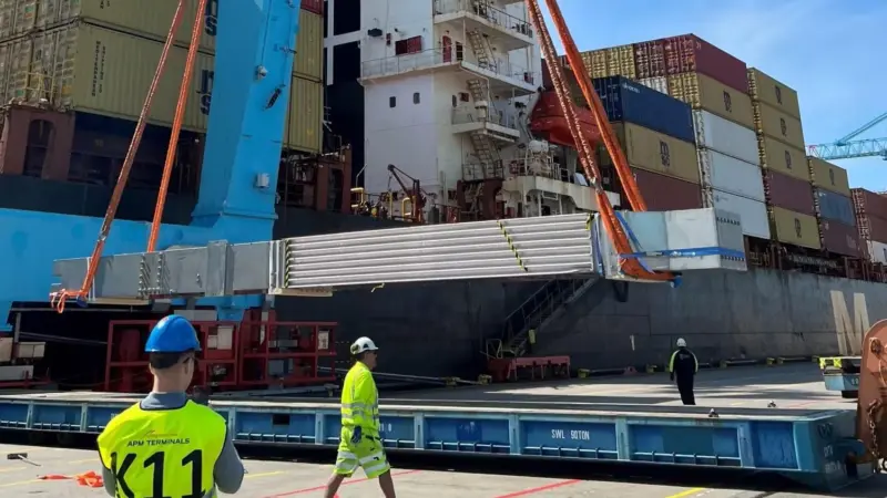 Workers at the Port of Gothenburg unloading breakbulk cargo