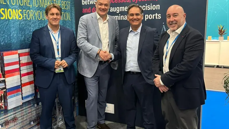 A photo of SAAM Terminals and Next Port AI representatives brokering the partnership