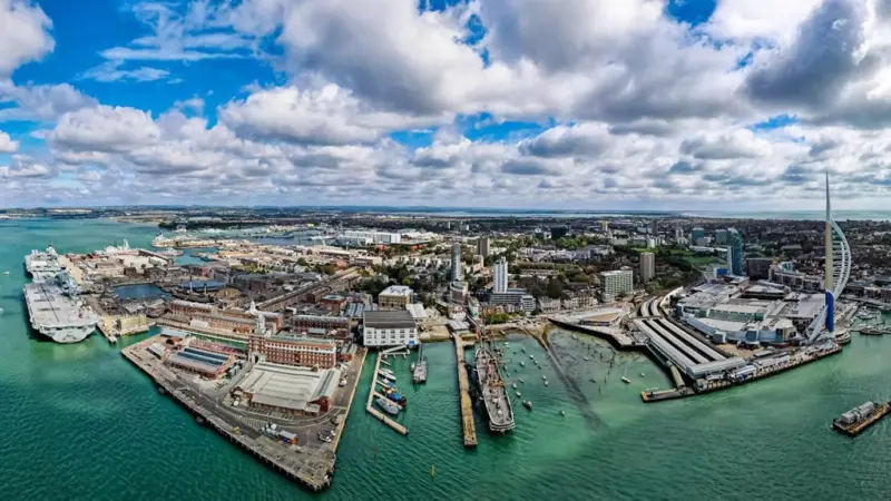 The image shows an overhead shot of Portsmouth Port