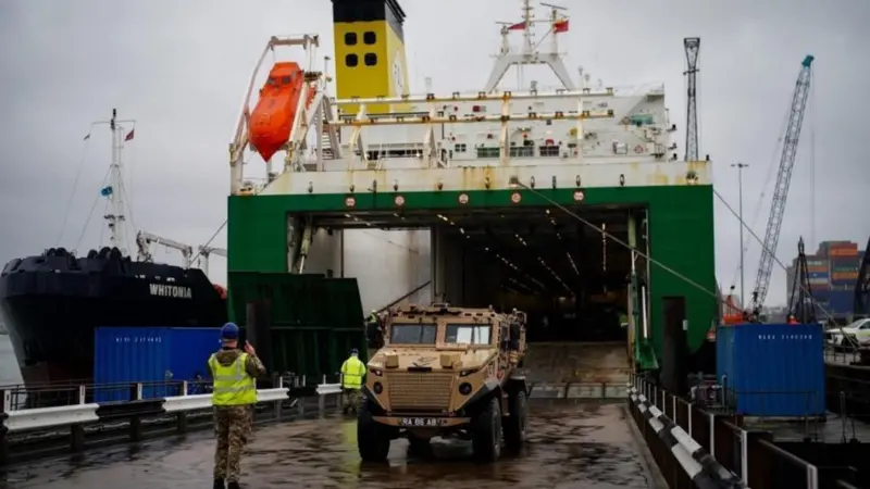 An army jeep driving off a ferry at an ABP port in the UK