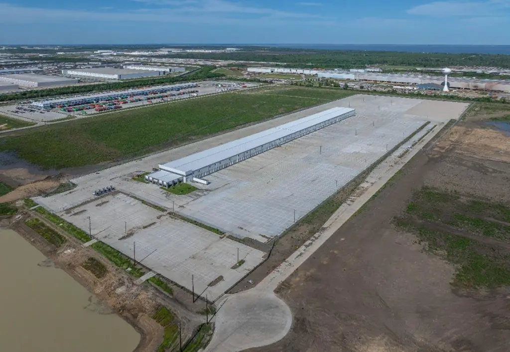Aerial shot of a large warehouse at Cedar-Port Operations and Logistics Terminal