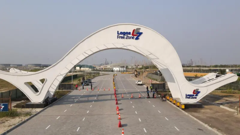 The image shows the entrance arch to Lagos Free Zone