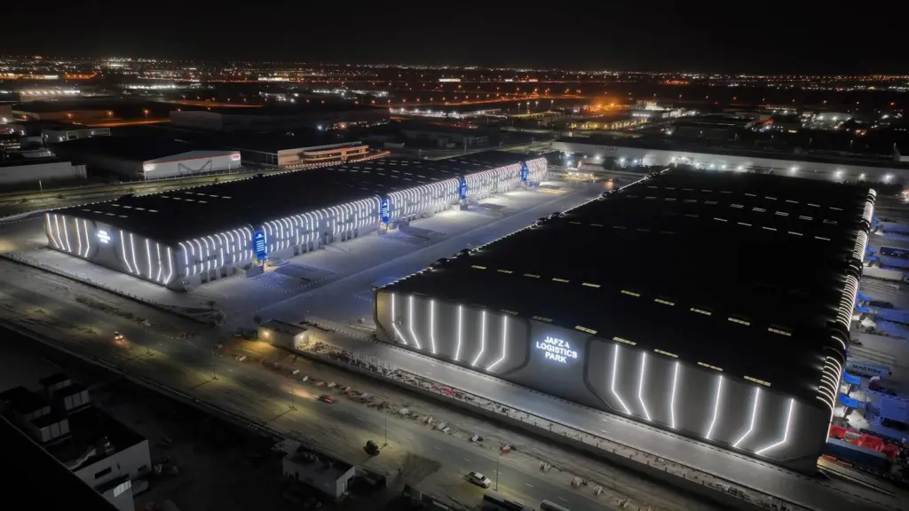 Aerial image of Jafza Logistics Park at night showing warehouses