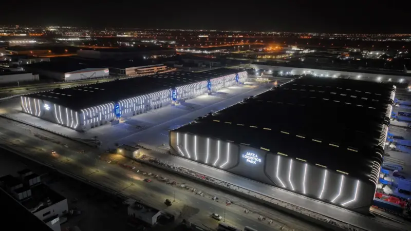 Aerial image of Jafza Logistics Park at night showing warehouses
