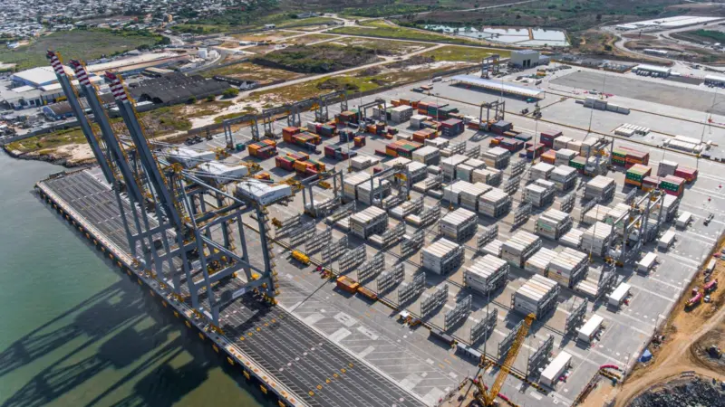 The photo shows an aerial shot of Ecuador's Port of Posorja