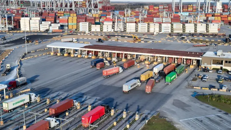 Containers, trucks and cranes at the Port of Savannah