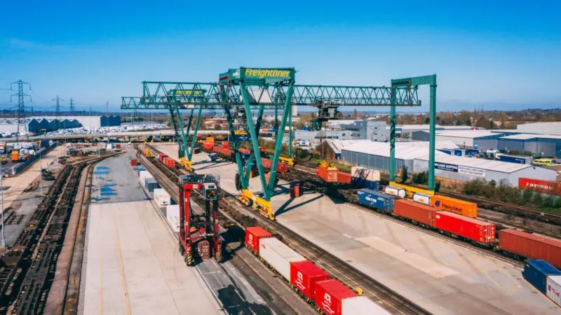 The image shows a Freightliner terminal