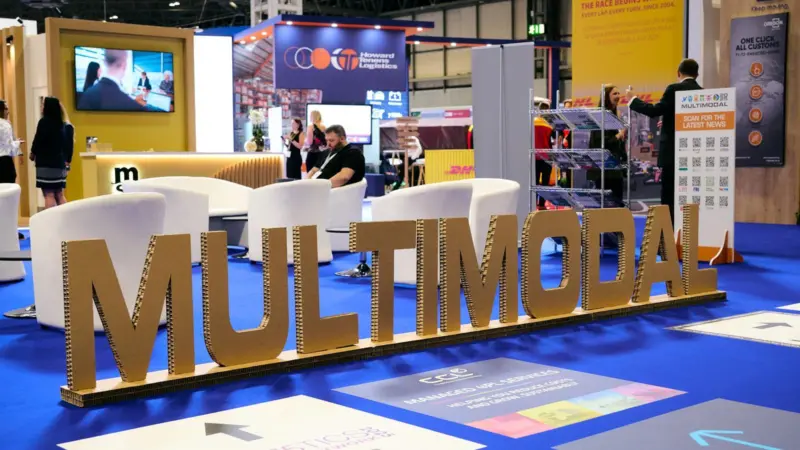 scene from Multimodal 2025 at the NEC in Birmingham. A big sign says MULTIMODAL with people in the background