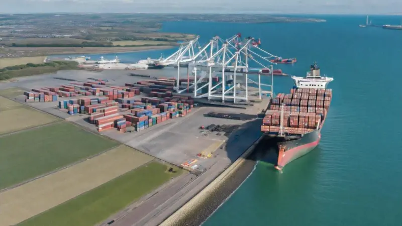 Generic image of a port with cranes and container ship shoreside