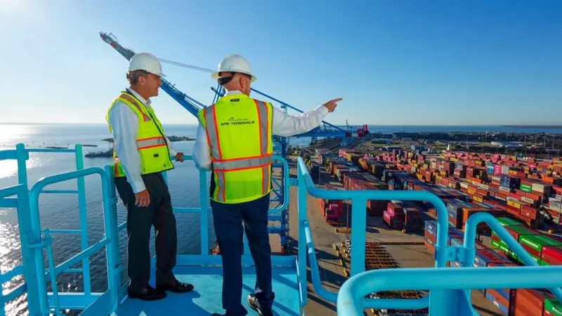Two APM Terminals employees at the Port of Mobile