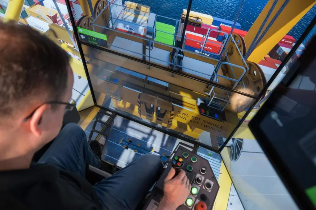 The image shows an operator undertaking CMLabs MasterCab STS crane simulator training