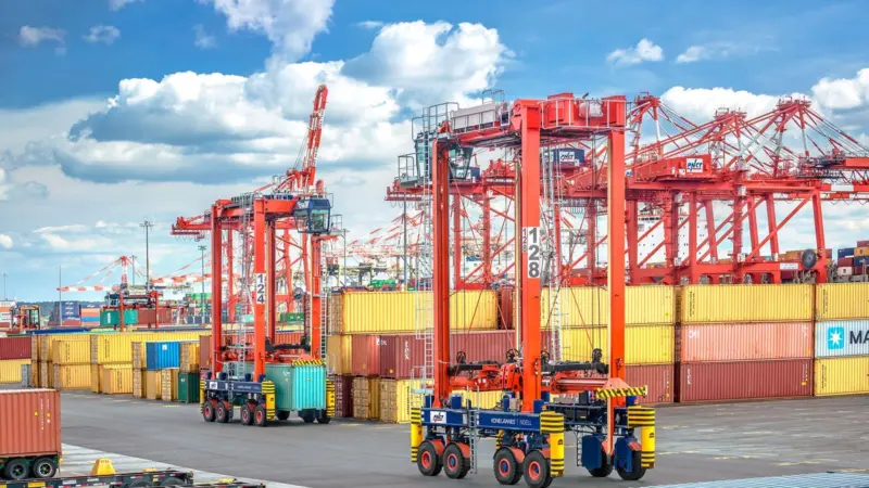 Two straddle carriers at Port Newark Container Terminal