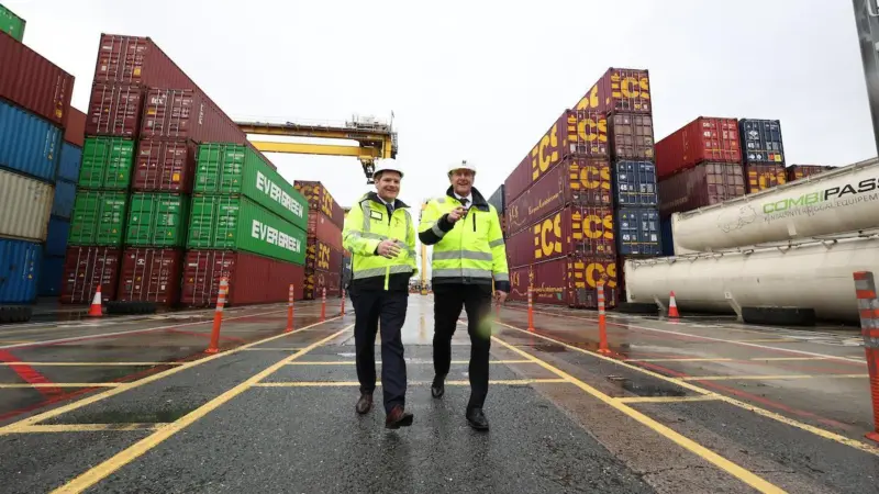 Peter Burke T.D., Minister for Enterprise, Tourism and Employment with Dublin Port CEO Barry O'Connell to mark the delivery of new refrigerated container infrastructure at Dublin Port.