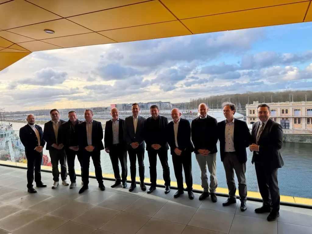 Members of MOSOLF at the Port of Oostende celebrating the opening of a new terminal