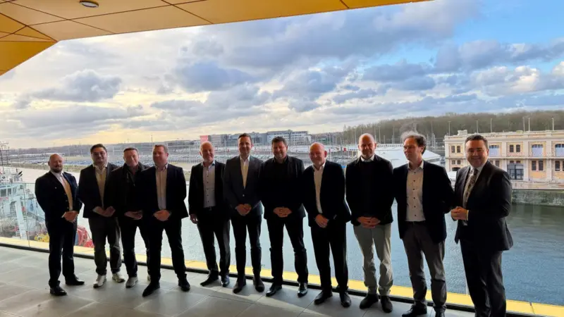 Members of MOSOLF at the Port of Oostende celebrating the opening of a new terminal