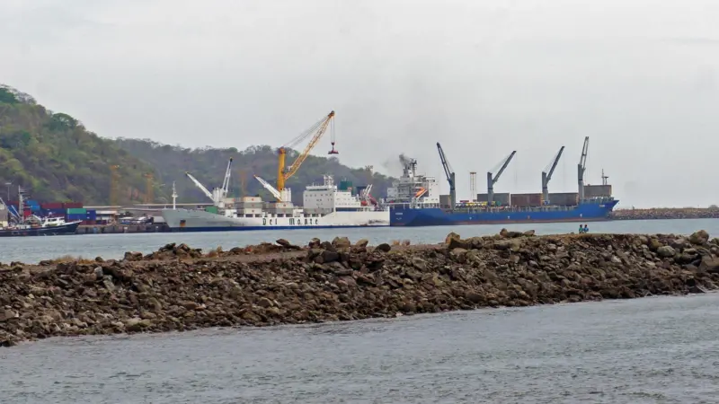 Puerto Caldera - two ships at port with a breakwater in the foreground