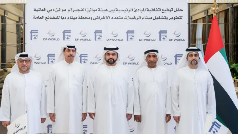 Members of DP World celebrating the agreement to develop Fujairah