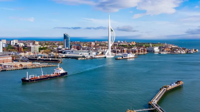 A wide angle shot of Portsmouth Harbour with the Spinnaker Tower in the background
